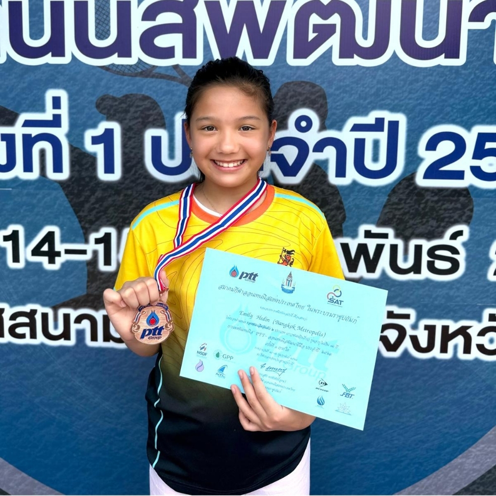 Emily Year 7 competing at the PTT Tennis Tournament in Thailand and celebrating her quarter-final victory